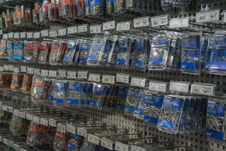 Packaged fixings, screws and hardware on the wall at Select Fasteners