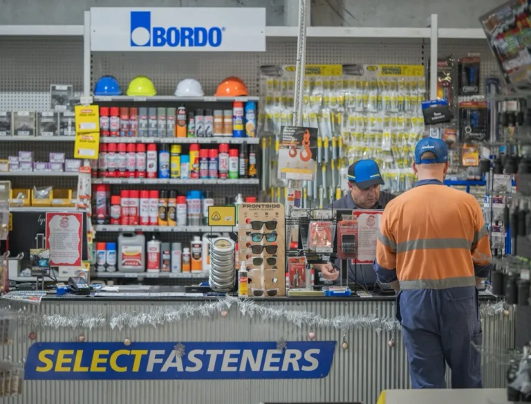 Tradie placing an order at the Select Fasteners counter