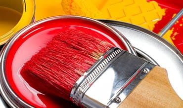 Closeup View of Brush and Red Paint — Building Supplies in Cessnock, NSW
