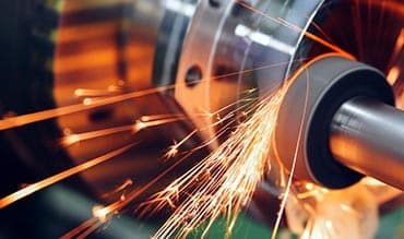 Grinder Polishing the Metal — Building Supplies in Port Stephens, NSW