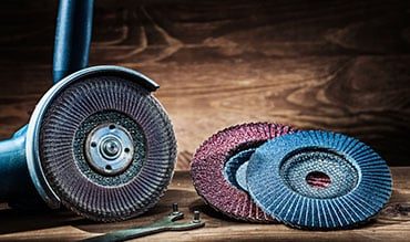 Grinder on Wooden Table — Building Supplies in Newcastle, NSW