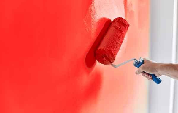 Man Paints the Wall — Building Supplies in Heatherbrae, NSW