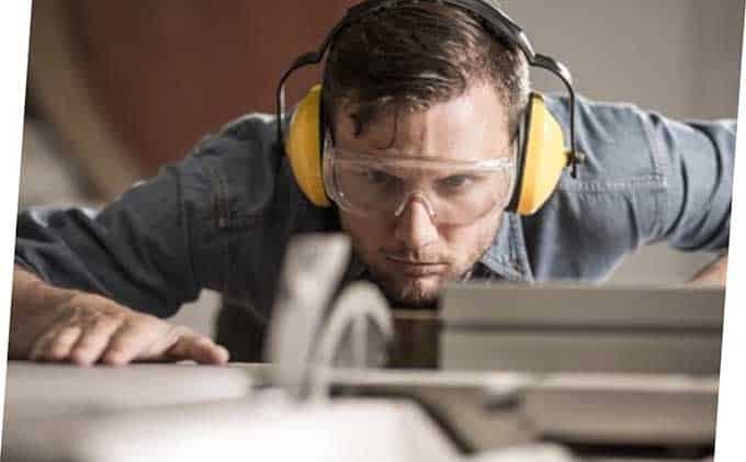 Man Spotting the Grinder — Building Supplies in Heatherbrae, NSW