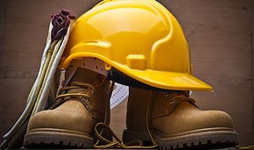 Safety Shoes and Helmet — Building Supplies in Newcastle, NSW