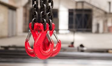 Three Red Crane Hooks — Building Supplies in Newcastle, NSW