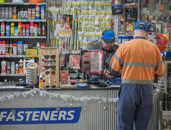 Tradie in hi-vis at the Select Fasteners counter in Heatherbrae